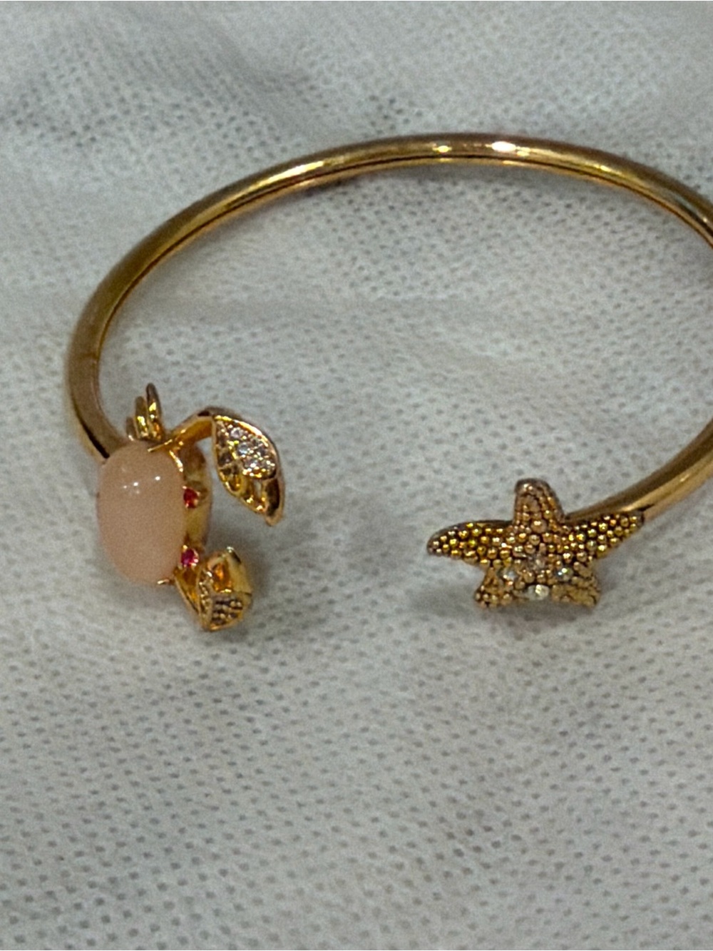 kate spade Gold Open Bangle with Pink Cabochon and Star Accent